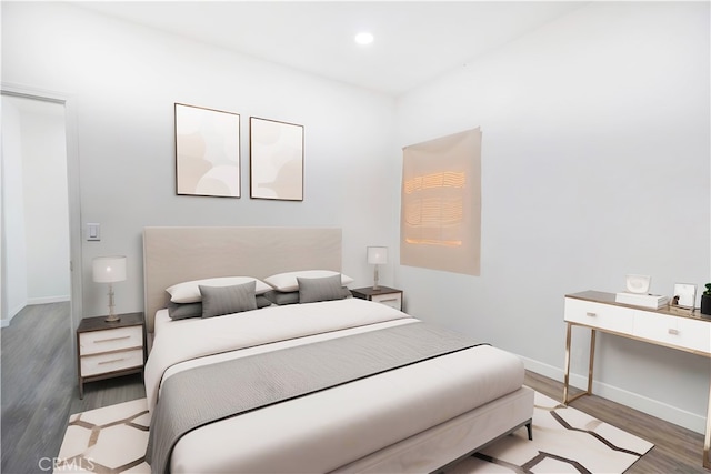 425 W 17th St, San Bernardino, CA 92405 - bedroom with wood finished floors and recessed lighting