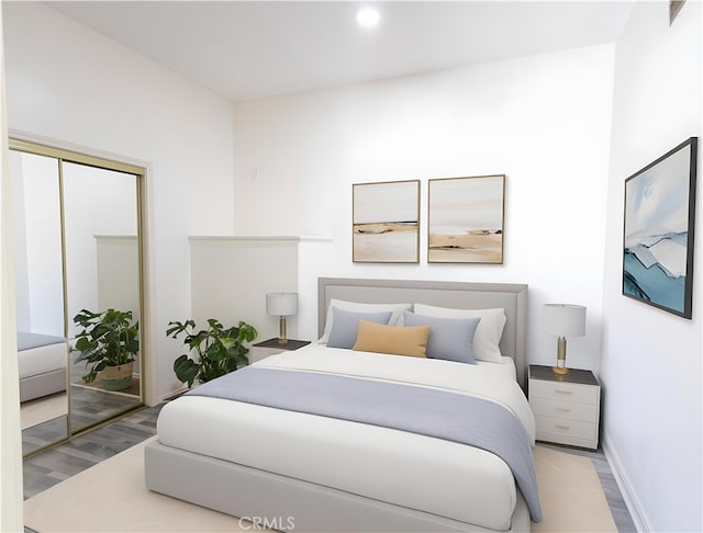 425 W 17th St, San Bernardino, CA 92405 - bedroom featuring wood finished floors, a closet, and recessed lighting