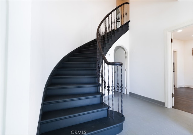 425 W 17th St, San Bernardino, CA 92405 - stairway featuring recessed lighting and a high ceiling