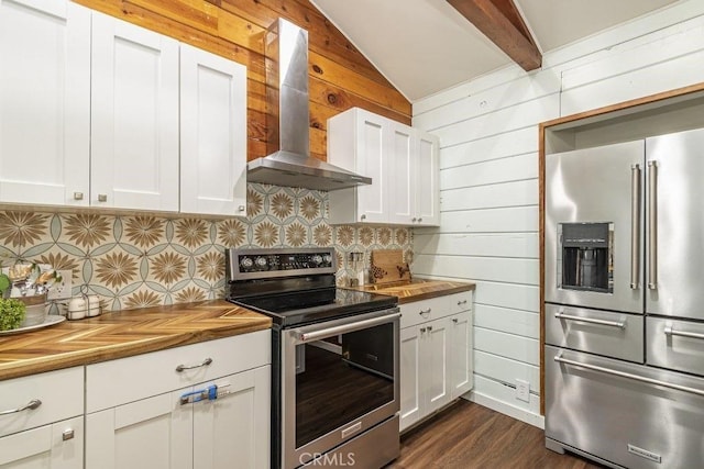 35853 Sierra Linda Dr, Wishon, CA 93669 - kitchen featuring stainless steel appliances, wall chimney range hood, wooden counters, backsplash, and dark wood-type flooring