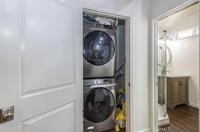 35853 Sierra Linda Dr, Wishon, CA 93669 - laundry area featuring stacked washer / drying machine and wood finished floors