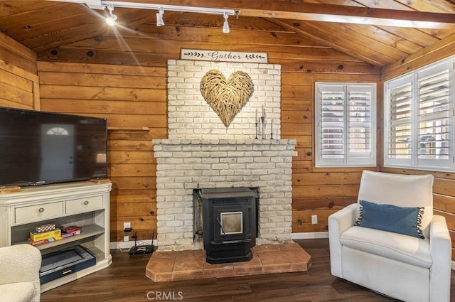 35853 Sierra Linda Dr, Wishon, CA 93669 - living area with a wood stove, wood finished floors, wooden walls, and wood ceiling