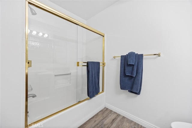 601 Las Arenas Ct, Bakersfield, CA 93314 - bathroom with shower / bath combination with glass door and wood finished floors