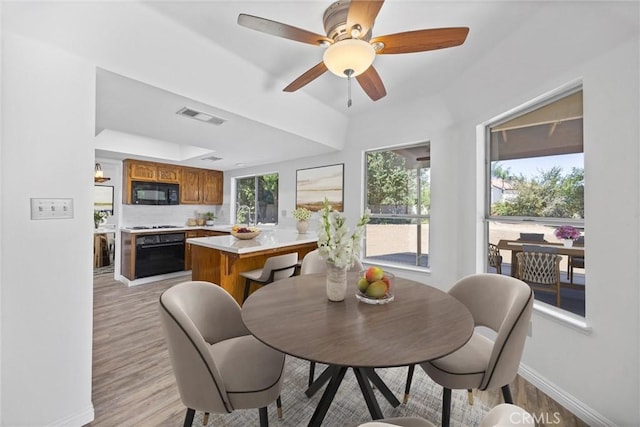 601 Las Arenas Ct, Bakersfield, CA 93314 - dining room with light wood-style floors and a ceiling fan