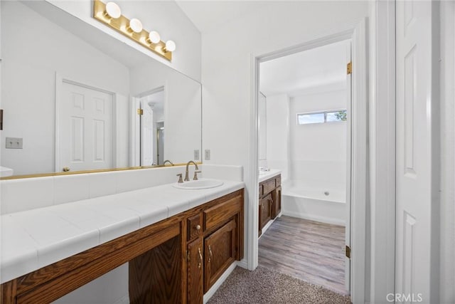 601 Las Arenas Ct, Bakersfield, CA 93314 - bathroom with vanity and a bath
