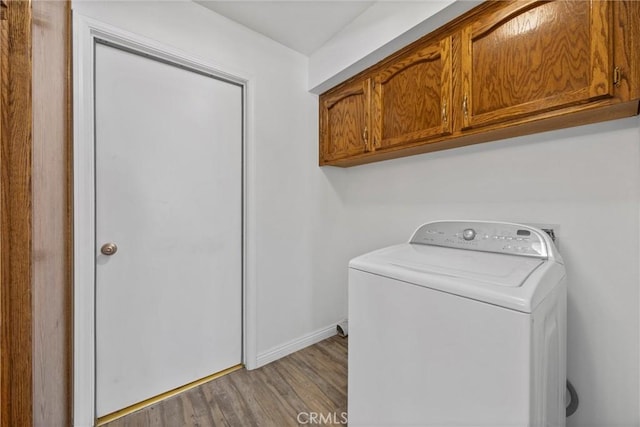 601 Las Arenas Ct, Bakersfield, CA 93314 - laundry area featuring washer / dryer, cabinet space, and light wood-style flooring
