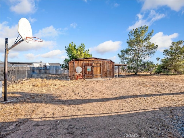 17911 Juniper St, Hesperia, CA 92345 - view of yard featuring an outdoor structure