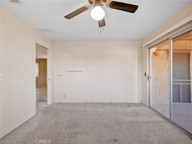 17911 Juniper St, Hesperia, CA 92345 - empty room featuring carpet floors and a ceiling fan