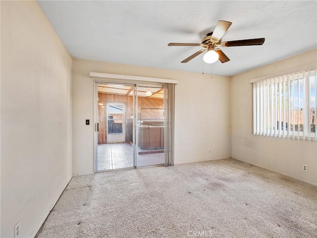 17911 Juniper St, Hesperia, CA 92345 - spare room with a ceiling fan and carpet