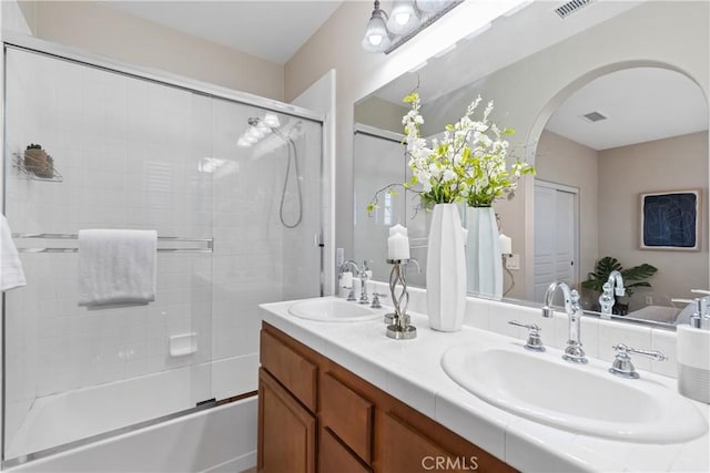 14 Tall Oak, Irvine, CA 92603 - bathroom with double vanity and shower / bath combination with glass door