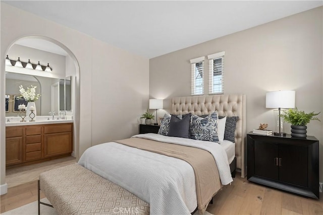 14 Tall Oak, Irvine, CA 92603 - bedroom with light wood finished floors and ensuite bathroom