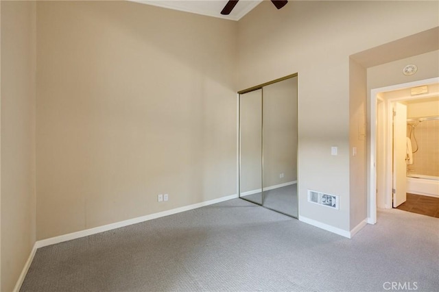 603 S Prospect Ave Unit 305, Redondo Beach, CA 90277 - unfurnished bedroom featuring carpet, a closet, ceiling fan, and lofted ceiling