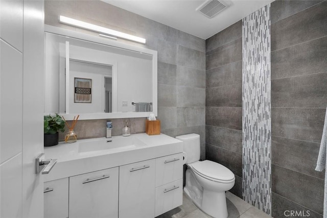 4764 Browndeer Ln, Rancho Palos Verdes, CA 90275 - bathroom with tile walls, vanity, and tile patterned floors