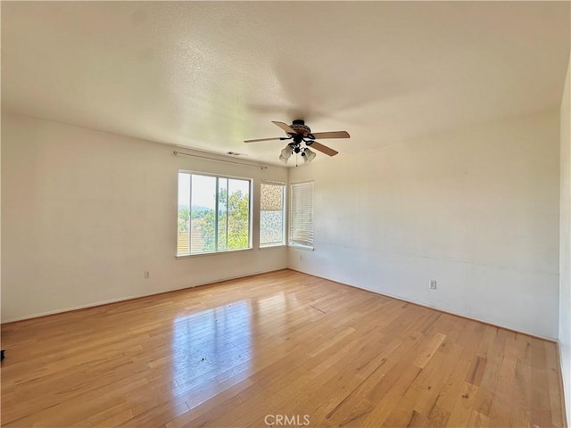 2244 Posada Ct, Corona, CA 92879 - empty room with ceiling fan and light wood finished floors