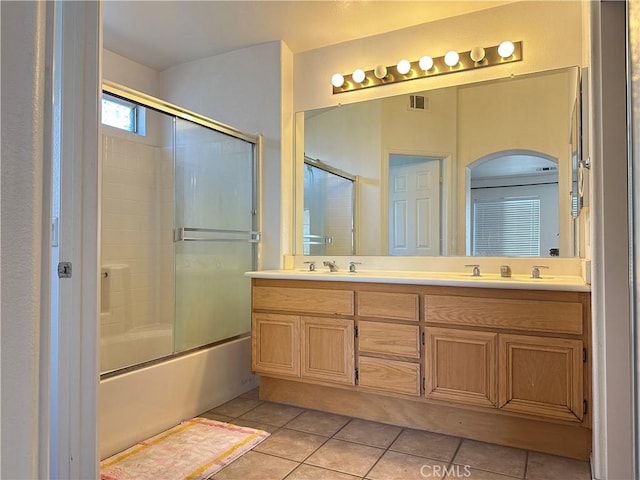 2244 Posada Ct, Corona, CA 92879 - full bath with tile patterned flooring, double vanity, and shower / bath combination with glass door