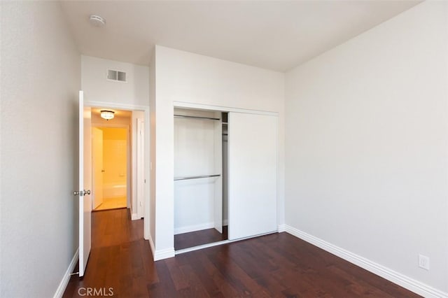 2567 Plaza Del Amo Unit 205, Torrance, CA 90503 - unfurnished bedroom featuring dark wood finished floors and a closet