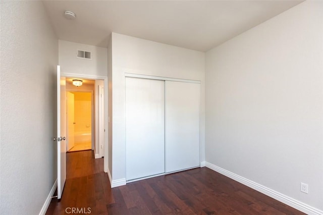 2567 Plaza Del Amo Unit 205, Torrance, CA 90503 - unfurnished bedroom with dark wood finished floors and a closet
