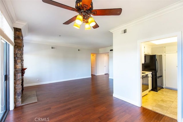 2567 Plaza Del Amo Unit 205, Torrance, CA 90503 - unfurnished living room with a ceiling fan, ornamental molding, a fireplace, and wood finished floors