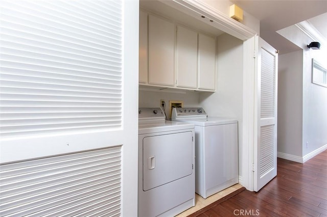 2567 Plaza Del Amo Unit 205, Torrance, CA 90503 - laundry area with washing machine and dryer, cabinet space, and light wood-style floors