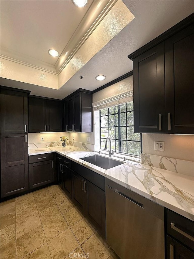 2567 Plaza Del Amo Unit 205, Torrance, CA 90503 - kitchen featuring dishwasher, crown molding, dark cabinetry, light stone countertops, and a tray ceiling