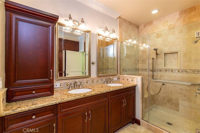 2567 Plaza Del Amo Unit 205, Torrance, CA 90503 - full bath featuring tiled shower, double vanity, and crown molding