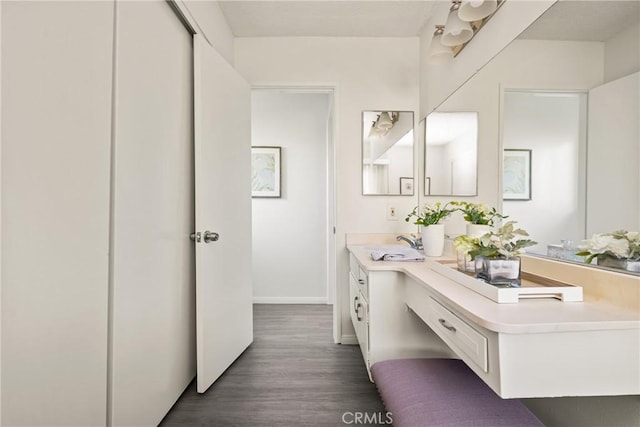 557 S Gardner Dr, Orange, CA 92866 - bathroom with wood finished floors and vanity