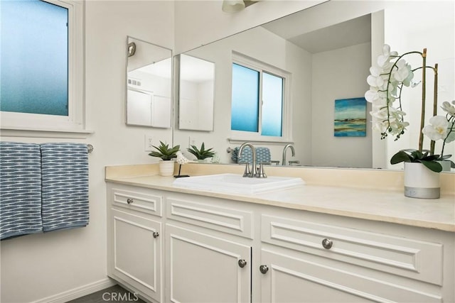 557 S Gardner Dr, Orange, CA 92866 - bathroom with vanity and baseboards