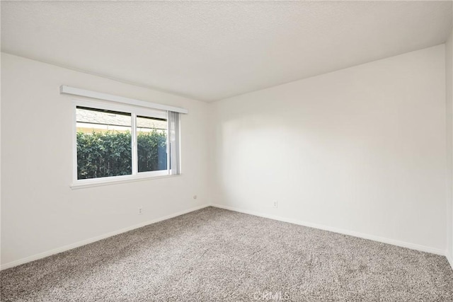 557 S Gardner Dr, Orange, CA 92866 - carpeted empty room featuring baseboards
