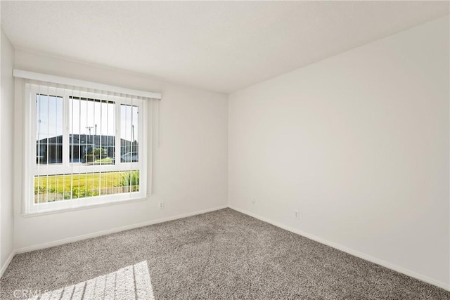 557 S Gardner Dr, Orange, CA 92866 - empty room featuring carpet floors and baseboards