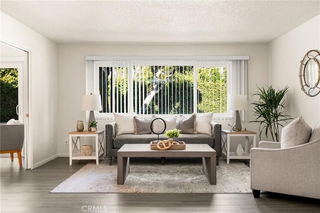 557 S Gardner Dr, Orange, CA 92866 - living area featuring healthy amount of natural light, wood finished floors, and a textured ceiling