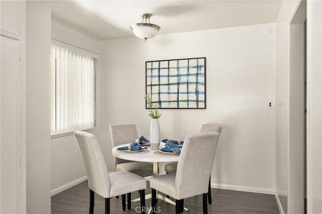 557 S Gardner Dr, Orange, CA 92866 - dining space with baseboards and wood finished floors
