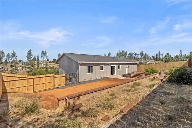 5616 Glen Way, Paradise, CA 95969 - back of property featuring a patio area, a gate, and board and batten siding