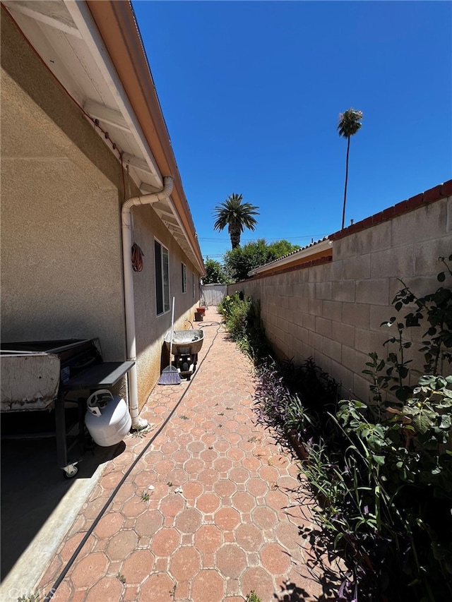 2932 Prospect Ave, Riverside, CA 92507 - fenced backyard with a patio area