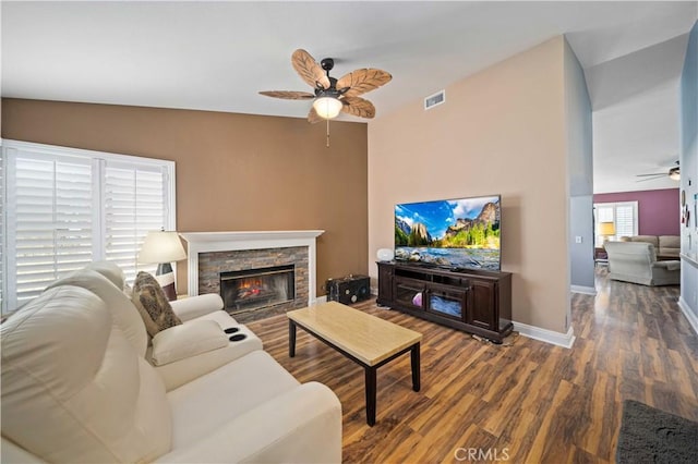 3310 Purple Sage Ln, Palmdale, CA 93550 - living room with ceiling fan, wood finished floors, and a fireplace