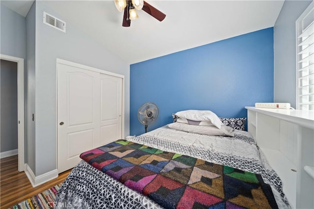 3310 Purple Sage Ln, Palmdale, CA 93550 - bedroom with wood finished floors, lofted ceiling, a closet, and a ceiling fan