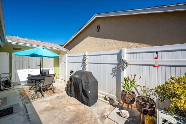18912 Circle Of The Oaks, Newhall, CA 91321 - fenced backyard featuring a patio area, grilling area, and outdoor dining area