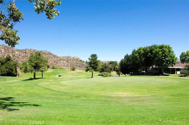 18912 Circle Of The Oaks, Newhall, CA 91321 - view of home's community featuring a mountain view, view of golf course, and a yard