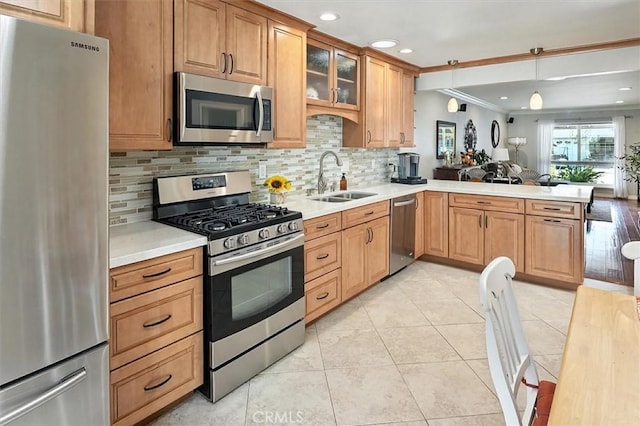 18912 Circle Of The Oaks, Newhall, CA 91321 - kitchen with stainless steel appliances, tasteful backsplash, light countertops, glass insert cabinets, and ornamental molding
