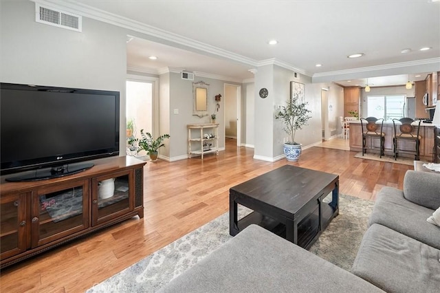 18912 Circle Of The Oaks, Newhall, CA 91321 - living area with light wood-style flooring, crown molding, and recessed lighting