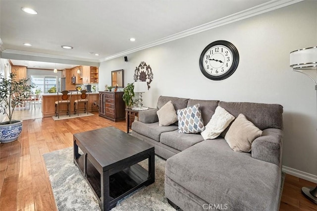 18912 Circle Of The Oaks, Newhall, CA 91321 - living area with crown molding, light wood finished floors, and recessed lighting