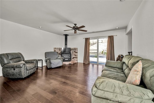 19650 Mountain Mdw N, Hidden Valley Lake, CA 95467 - living area featuring a wood stove, a ceiling fan, wood finished floors, and recessed lighting