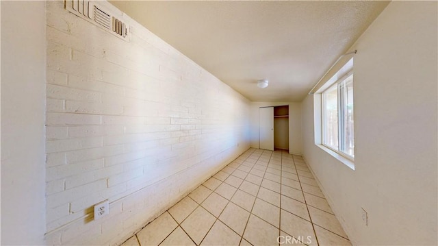 21845 Fox Ave, Apple Valley, CA 92307 - unfurnished room featuring light tile patterned floors