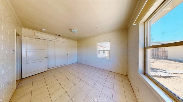 21845 Fox Ave, Apple Valley, CA 92307 - unfurnished bedroom with light tile patterned flooring