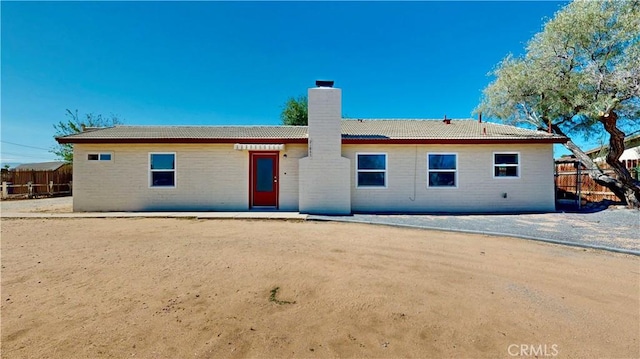 21845 Fox Ave, Apple Valley, CA 92307 - view of front facade with a chimney and a tile roof