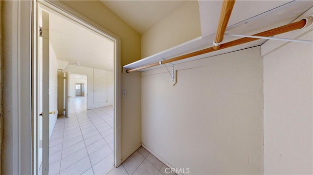21845 Fox Ave, Apple Valley, CA 92307 - walk in closet with light tile patterned floors