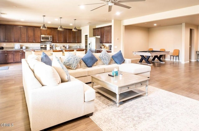 84319 Cigno Ct, Indio, CA 92203 - living area with ceiling fan, recessed lighting, and light wood-style floors