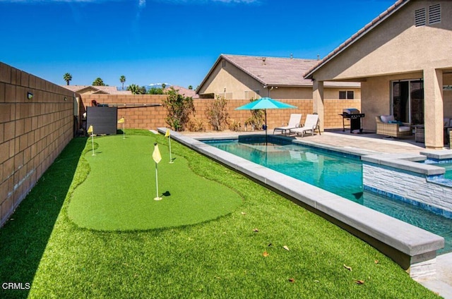 84319 Cigno Ct, Indio, CA 92203 - view of pool featuring a putting green, a patio, a hot tub, a fenced backyard, and grilling area
