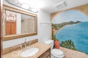 25152 Mammoth Cir, Lake Forest, CA 92630 - full bathroom featuring vanity, a shower, and a water view