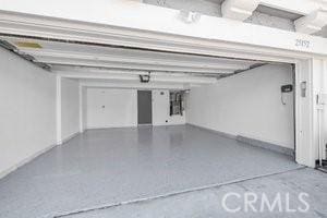 25152 Mammoth Cir, Lake Forest, CA 92630 - garage with baseboards