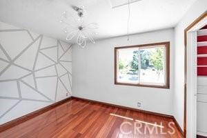 25152 Mammoth Cir, Lake Forest, CA 92630 - unfurnished bedroom with wood finished floors and baseboards